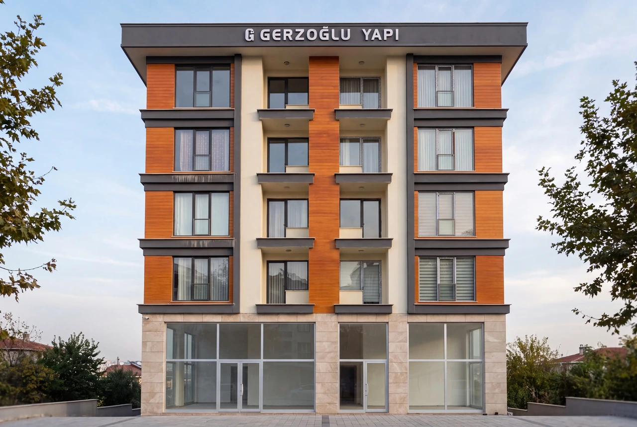 Sancaktepe Konut ve İşyeri Projesi; krem cephe, terrakota kaplama ve antrasit bantlar